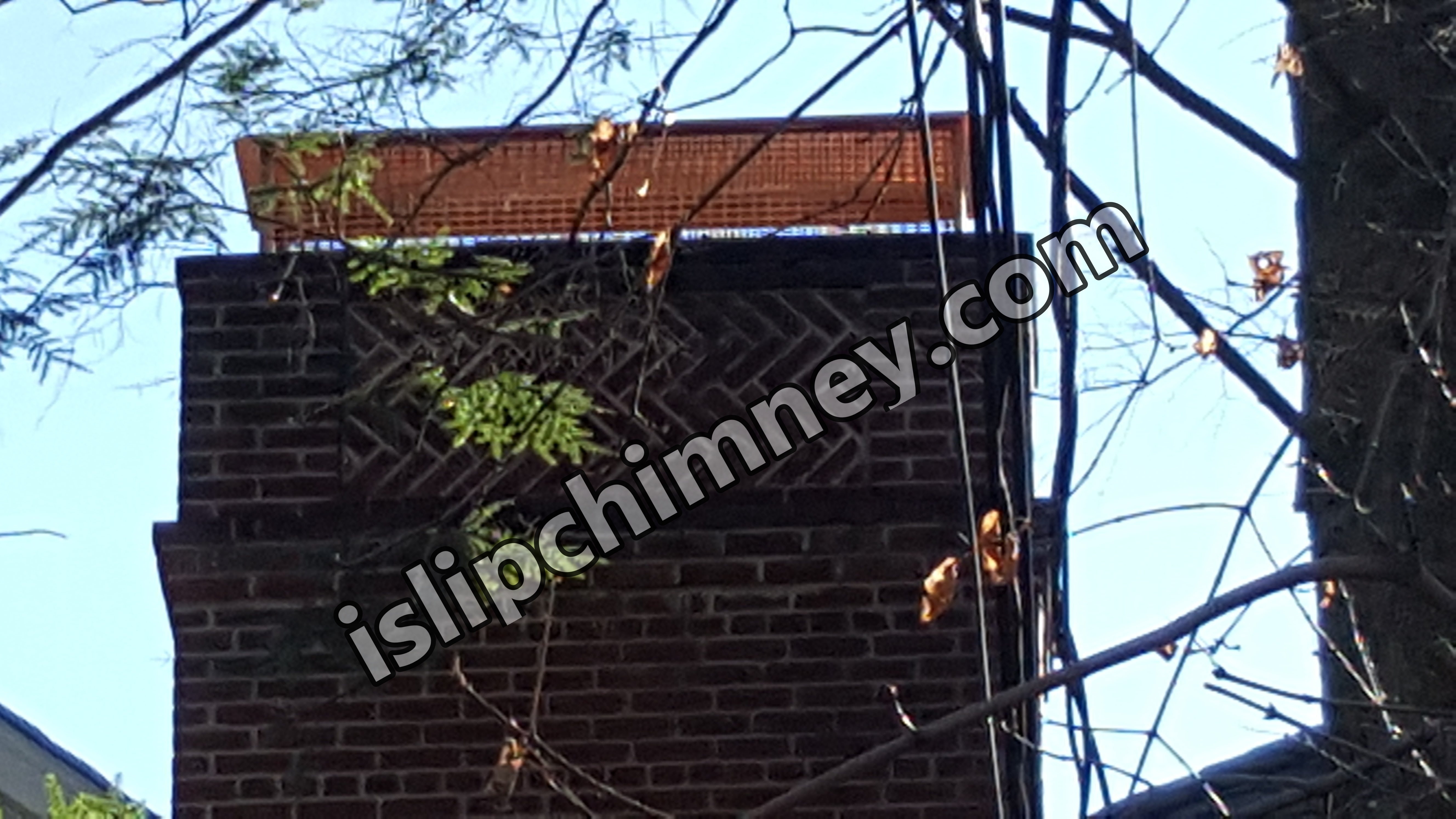 Animal-proof chimney cap protecting home in Islip, New York