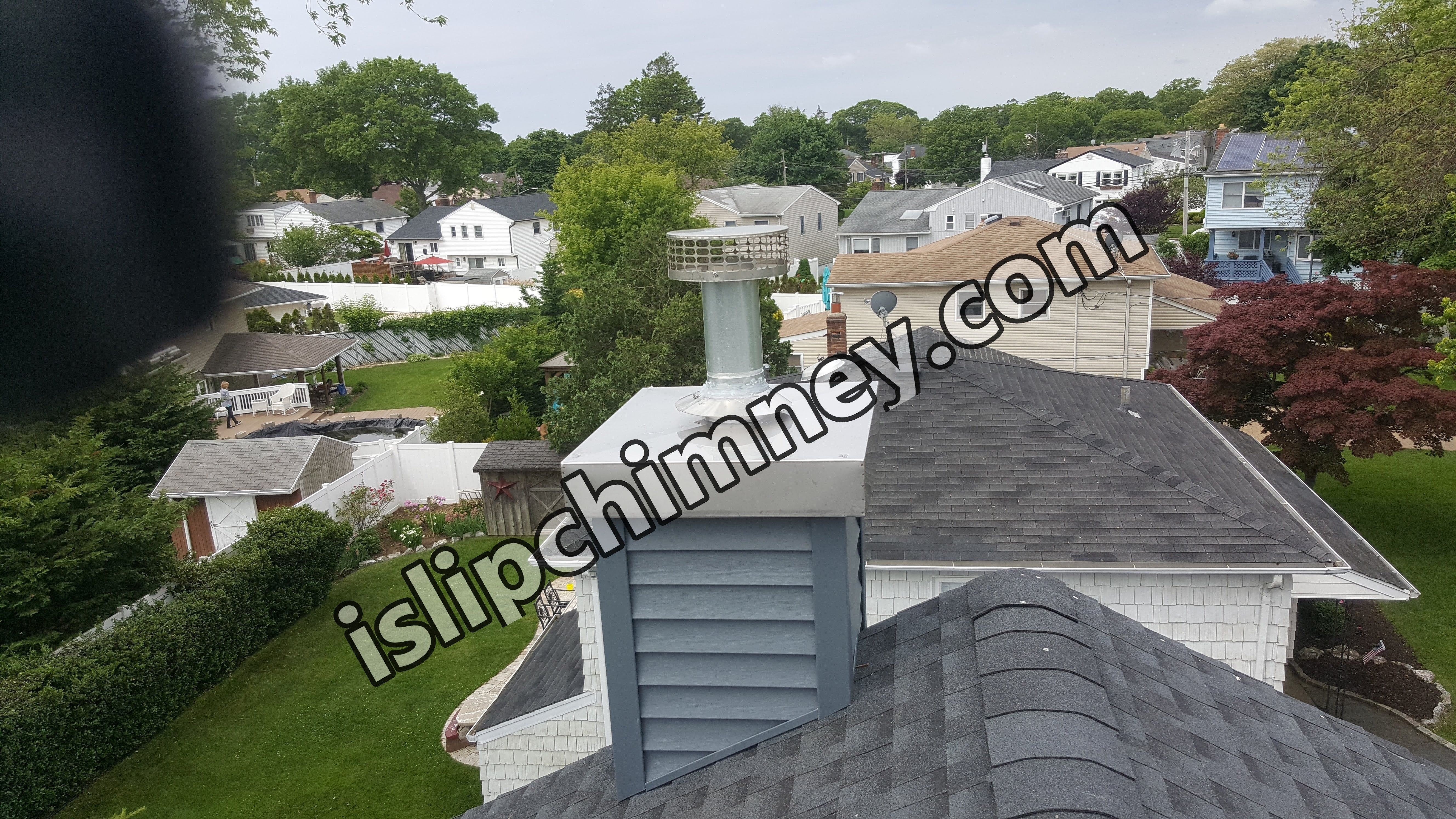 Complete chimney crown rebuild and waterproofing in Islip, New York