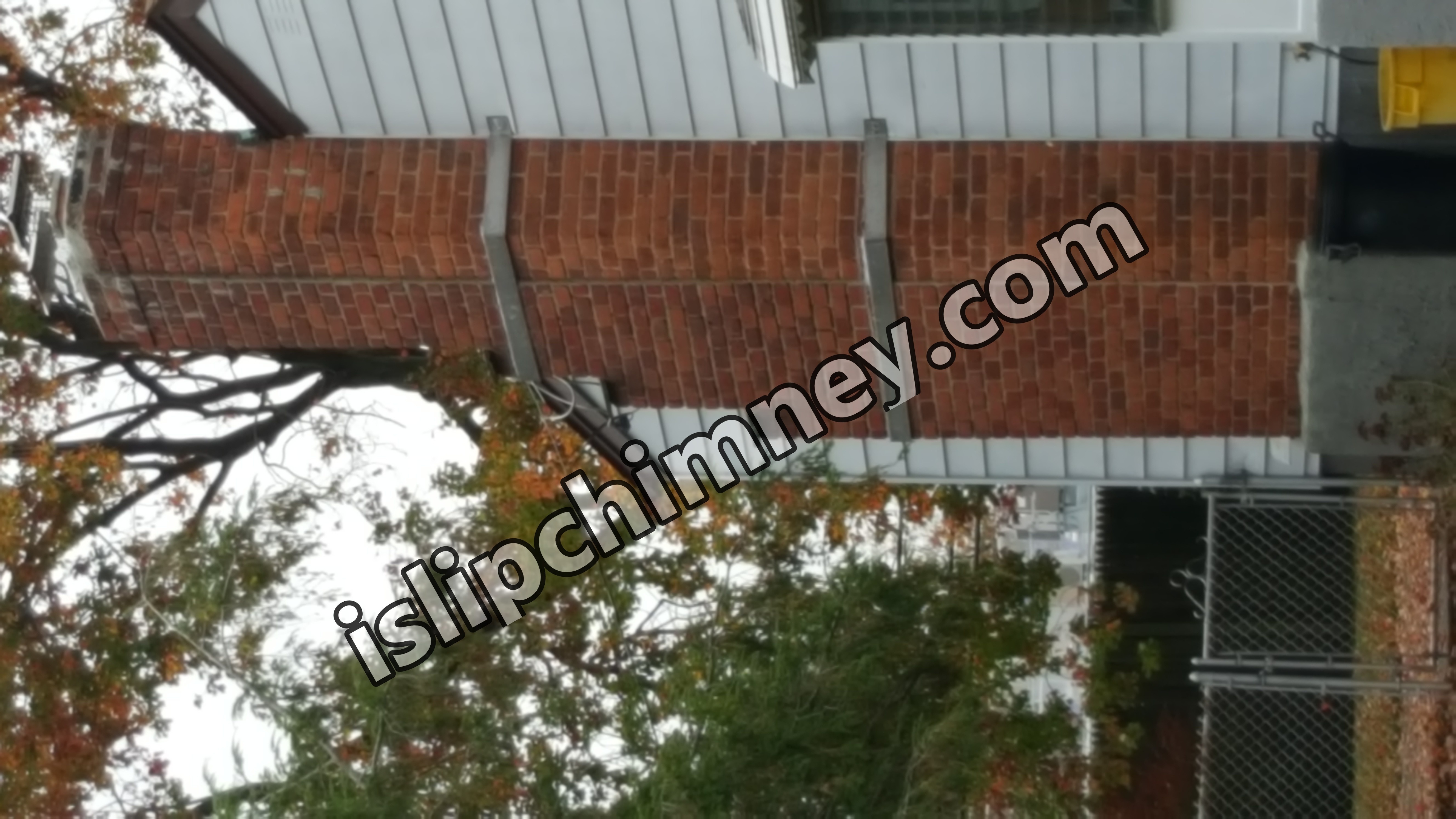 Heavy oil soot removal from chimney flue in Islip, New York